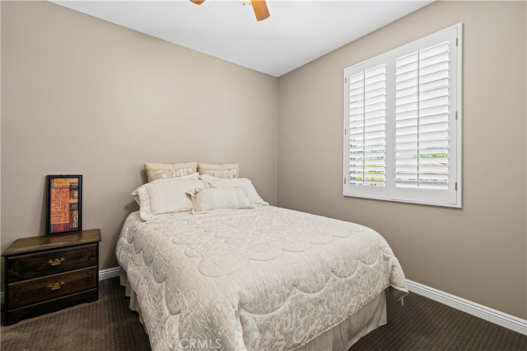 25221 Summerhill Lane Stevenson Ranch, CA 91381 - Photo 38 of 74 a bedroom with a bed and a window
