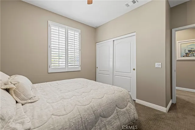 a view of a patio with swimming pool table and chairs