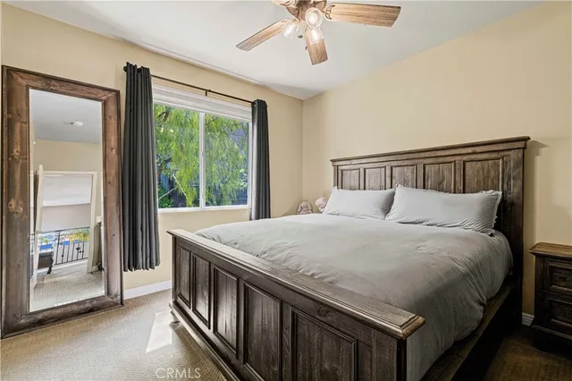 a pathway of a house with a yard