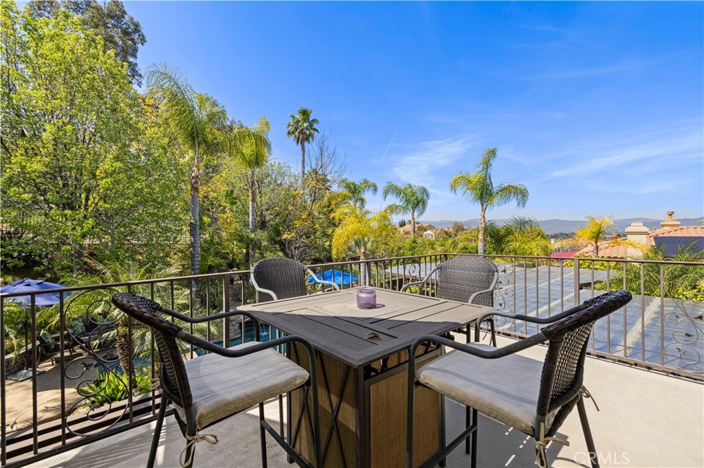 25221 Summerhill Lane Stevenson Ranch, CA 91381 - Photo 50 of 74 a view of a terrace with furniture and stove