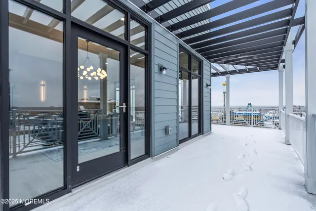 a view of a balcony with wooden floor