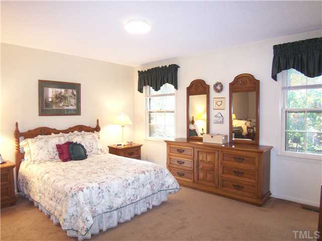 908 Hemingway Drive Raleigh, NC 27609 - Photo 11 of 25 The bright & spacious Master Bedroom has a lg closet, neutral carpet and private Bath.
