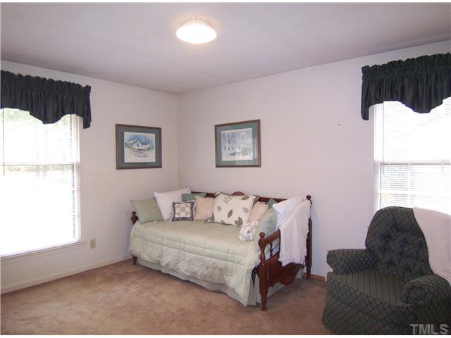 908 Hemingway Drive Raleigh, NC 27609 - Photo 14 of 25 The 2 add'l spacious Bedrooms on this level have lg closets & neutral carpet, and they share the lg hall Bath. This is Bedroom 2, which is currently adjoined to the Master Bedroom by double doors (great for a nursery!).