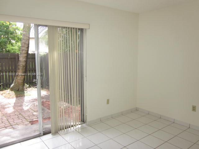 11350 Southwest 68th Terrace Miami, FL 33173 - Photo 13 of 31 a view of a room that has a window in it