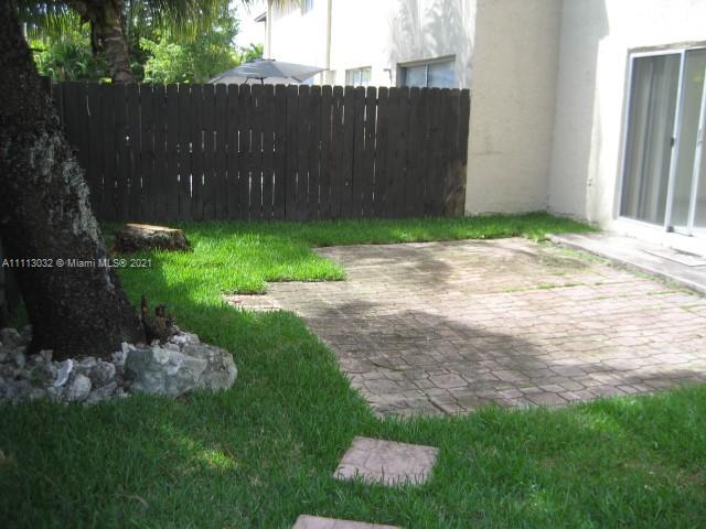 11350 Southwest 68th Terrace Miami, FL 33173 - Photo 16 of 31 a backyard of a house with lots of green space