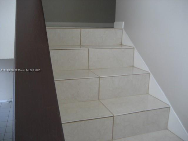 11350 Southwest 68th Terrace Miami, FL 33173 - Photo 18 of 31 a close up view of washer and dryer