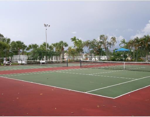 11350 Southwest 68th Terrace Miami, FL 33173 - Photo 25 of 31 a view of a tennis court