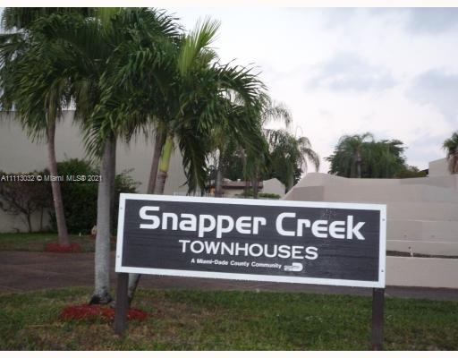 11350 Southwest 68th Terrace Miami, FL 33173 - Photo 26 of 31 a street sign sitting on the side of a road