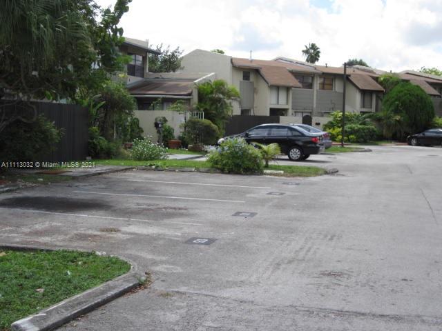 11350 Southwest 68th Terrace Miami, FL 33173 - Photo 28 of 31 a front view of house with yard and trees around