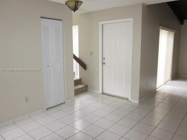 11350 Southwest 68th Terrace Miami, FL 33173 - Photo 4 of 31 a view of an empty room and window