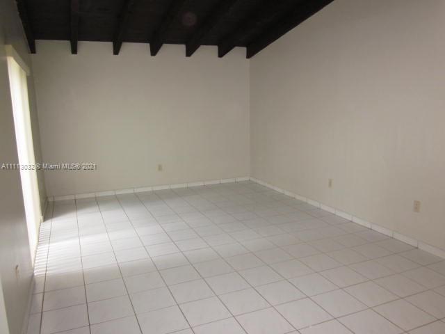 11350 Southwest 68th Terrace Miami, FL 33173 - Photo 6 of 31 a view of an empty room