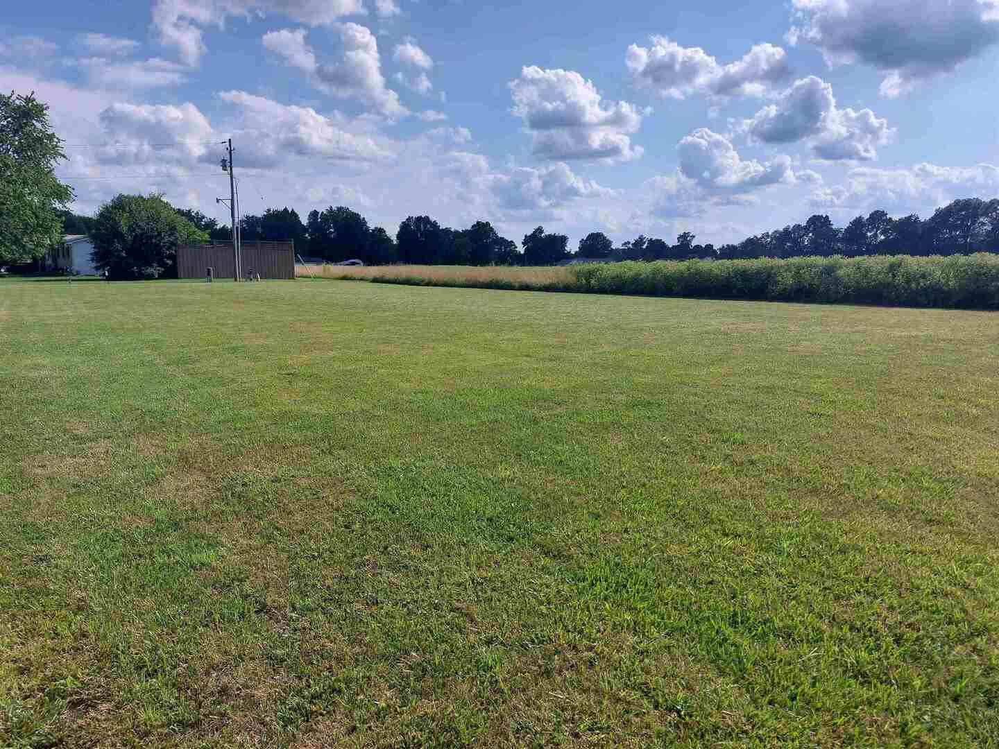 1701 Triangle Street Mount Vernon, IL 62864 - Photo 3 of 7 a view of a lake and sunset