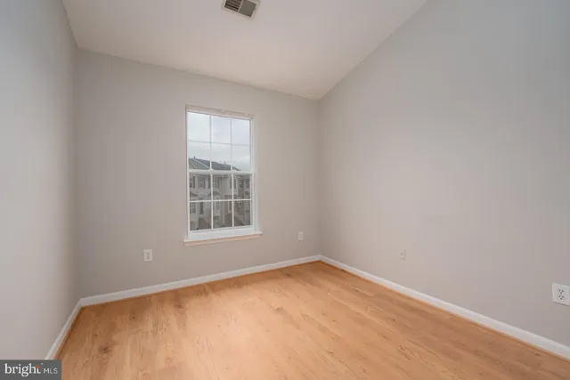 a view of a room with a window