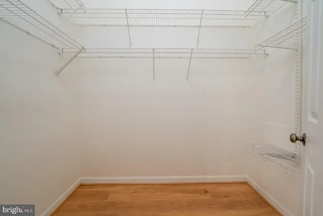 a view of a room with racks on the wall