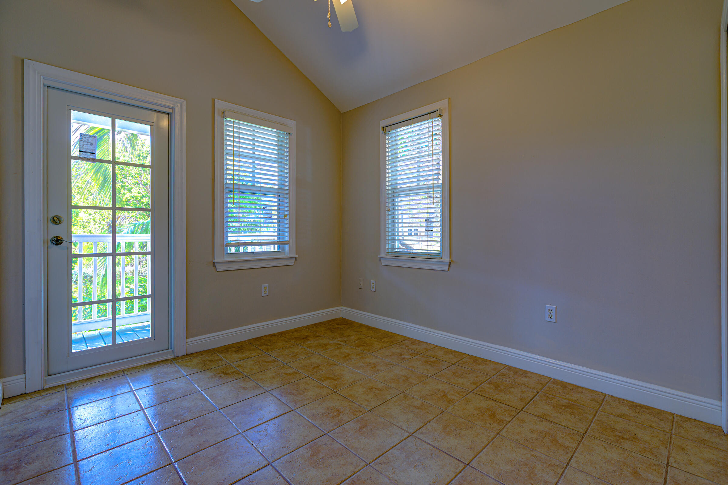 263 Golf Club Drive Key West, FL 33040 - Photo 20 of 30 a view of an empty room with a window