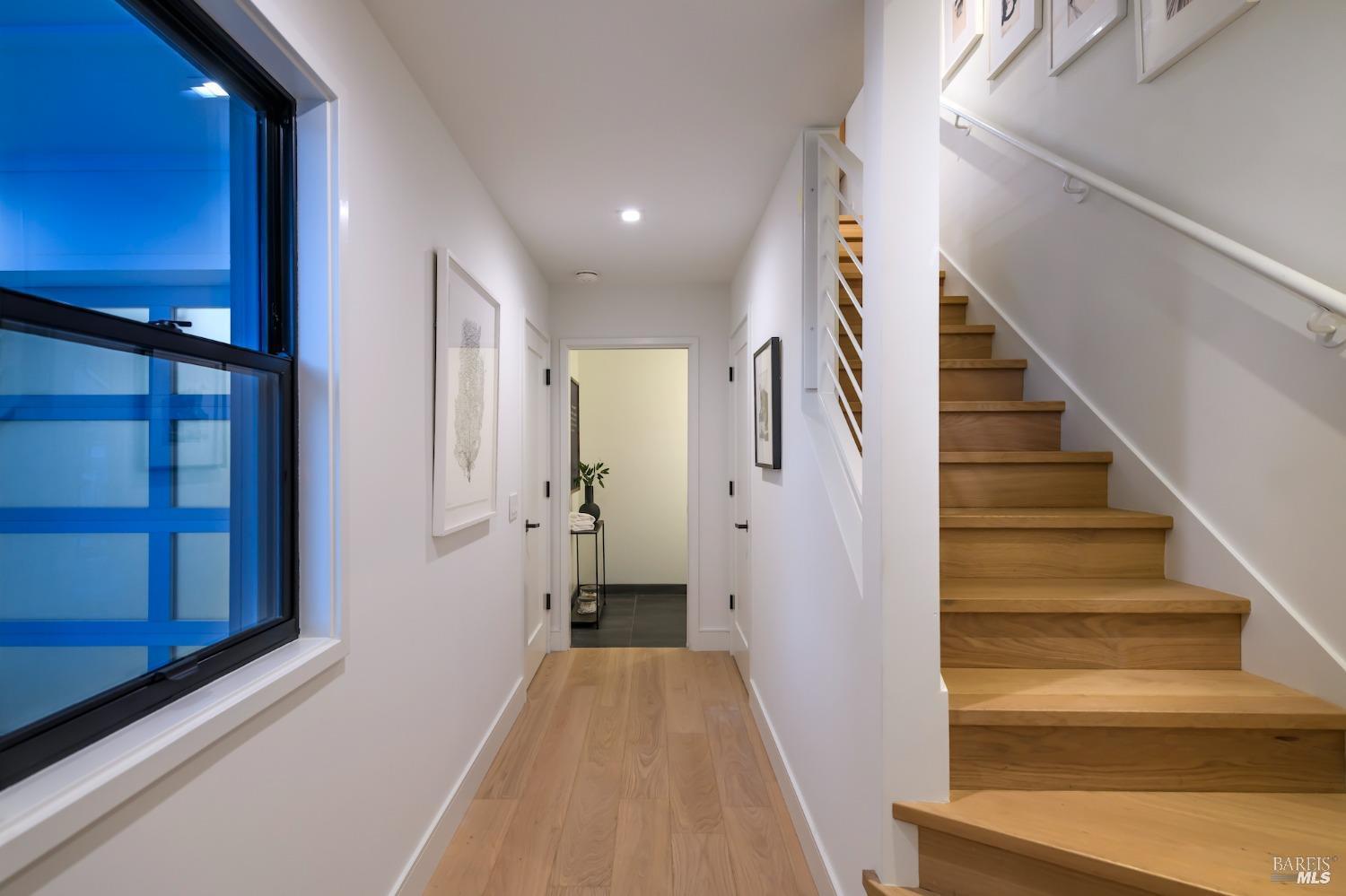 1112 Foster Road Napa, CA 94558 - Photo 4 of 26 a view of a hallway with wooden floor and entryway