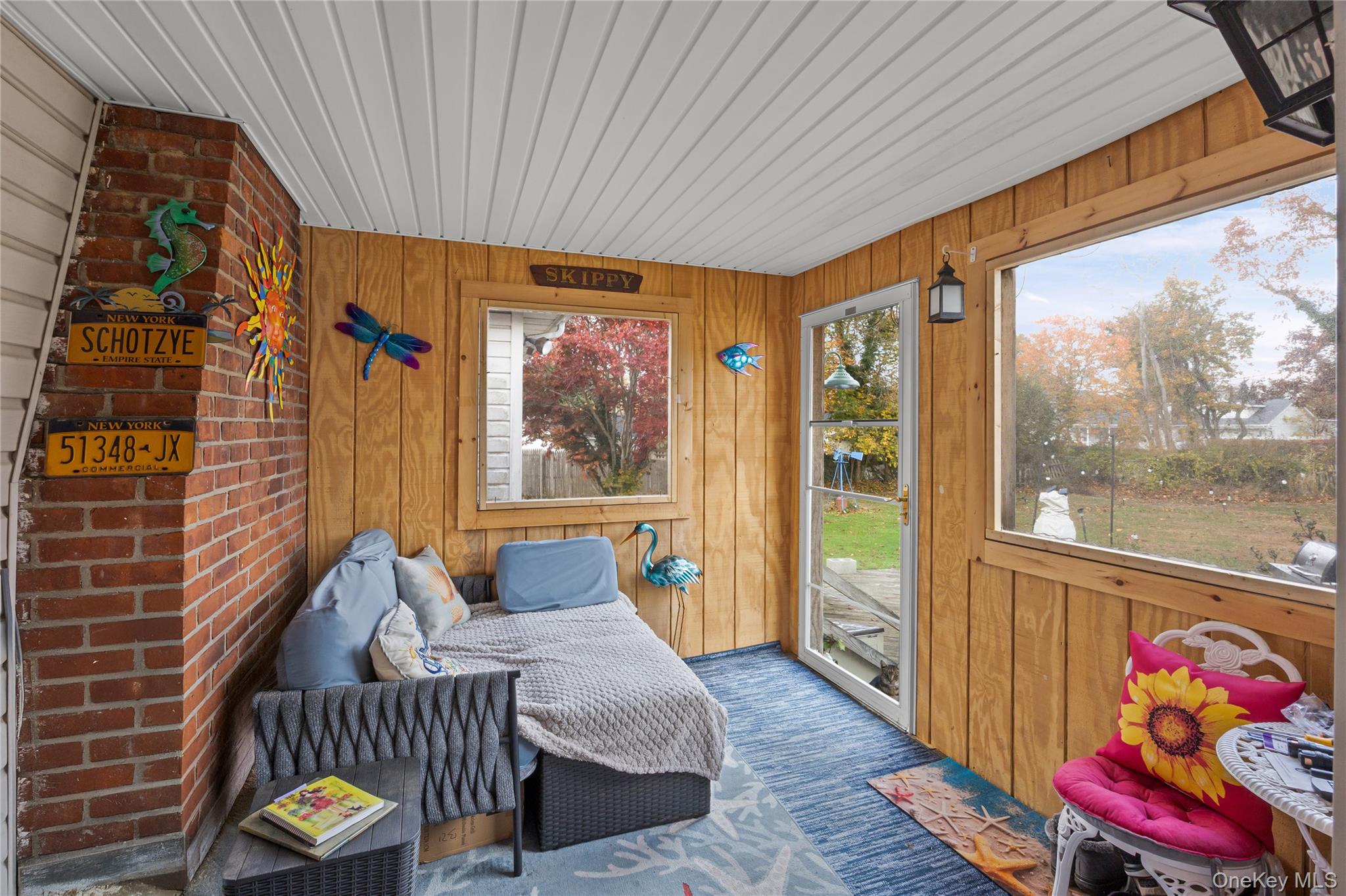 1 Elm Road East Mastic Beach, NY 11951 - Photo 19 of 28 a bedroom with a bed and a window