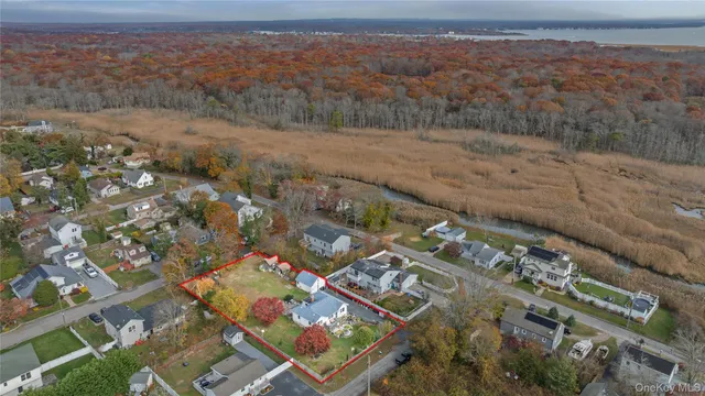an aerial view of residential building and parking space