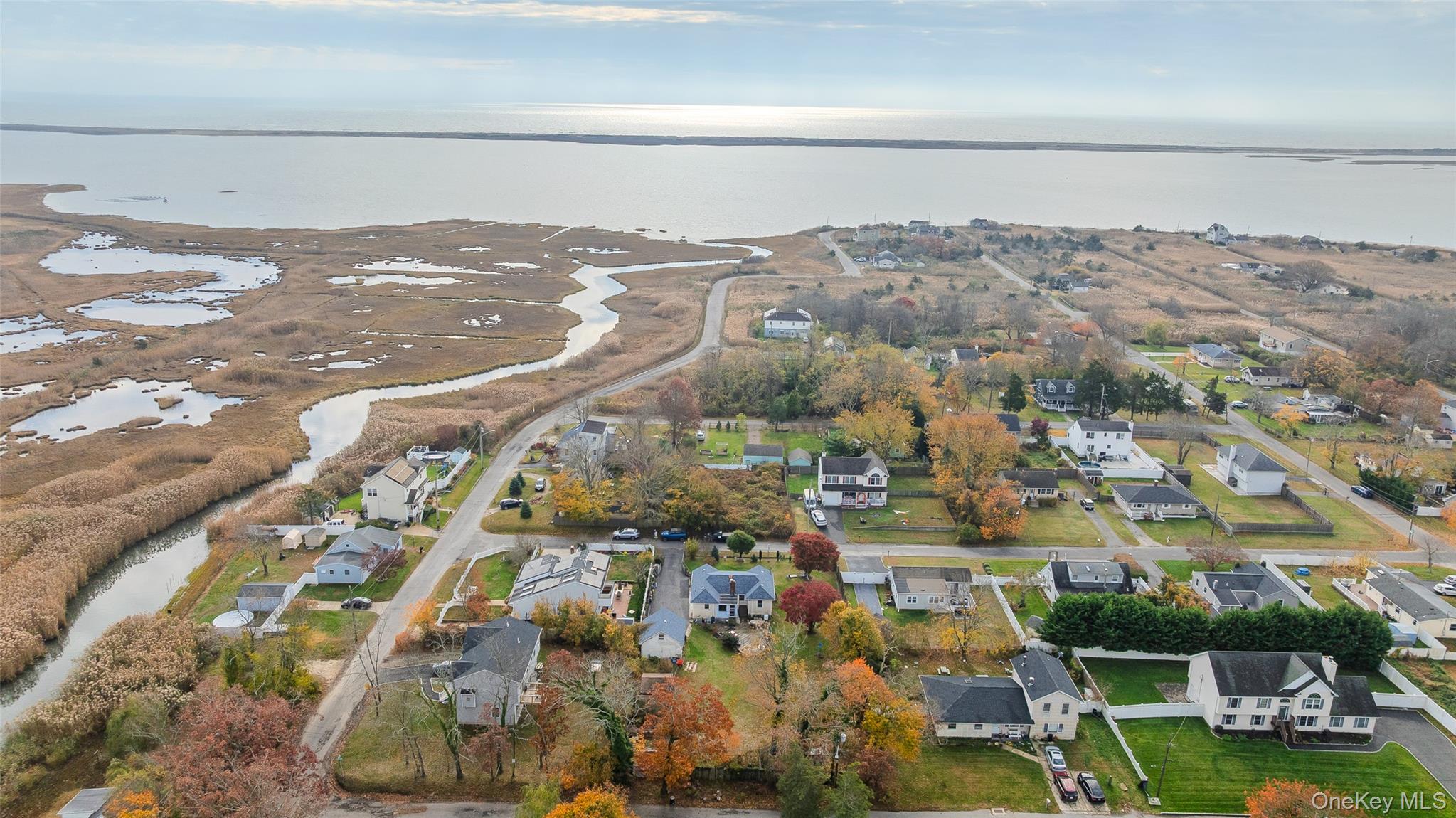 1 Elm Road East Mastic Beach, NY 11951 - Photo 24 of 28 an aerial view of residential building and parking space