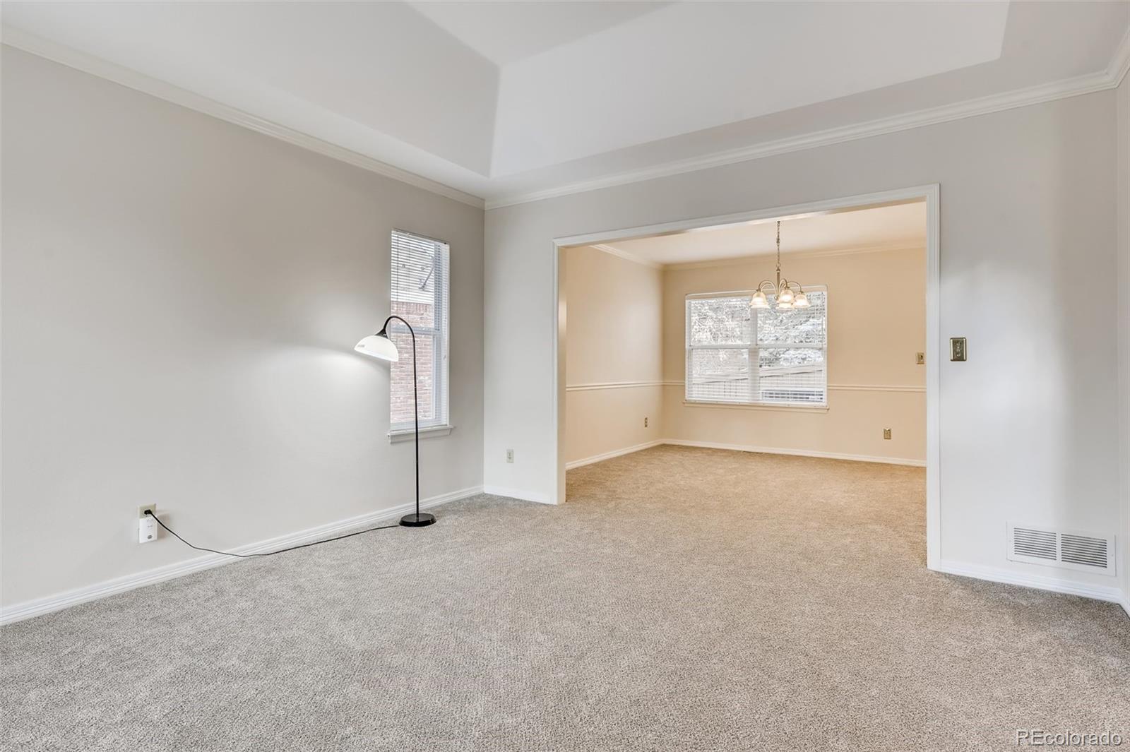 9396 Desert Willow Road Highlands Ranch, CO 80129 - Photo 3 of 40 a view of an empty room with a window