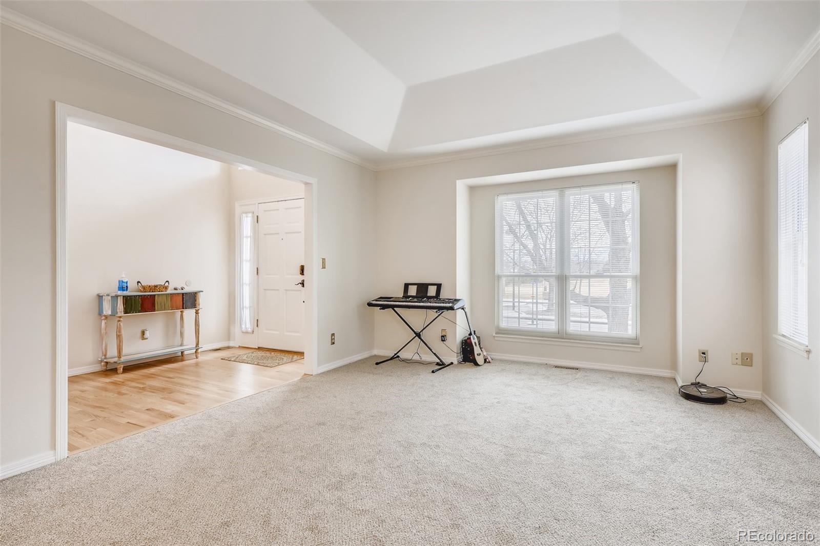 9396 Desert Willow Road Highlands Ranch, CO 80129 - Photo 4 of 40 a view of an empty room with a window