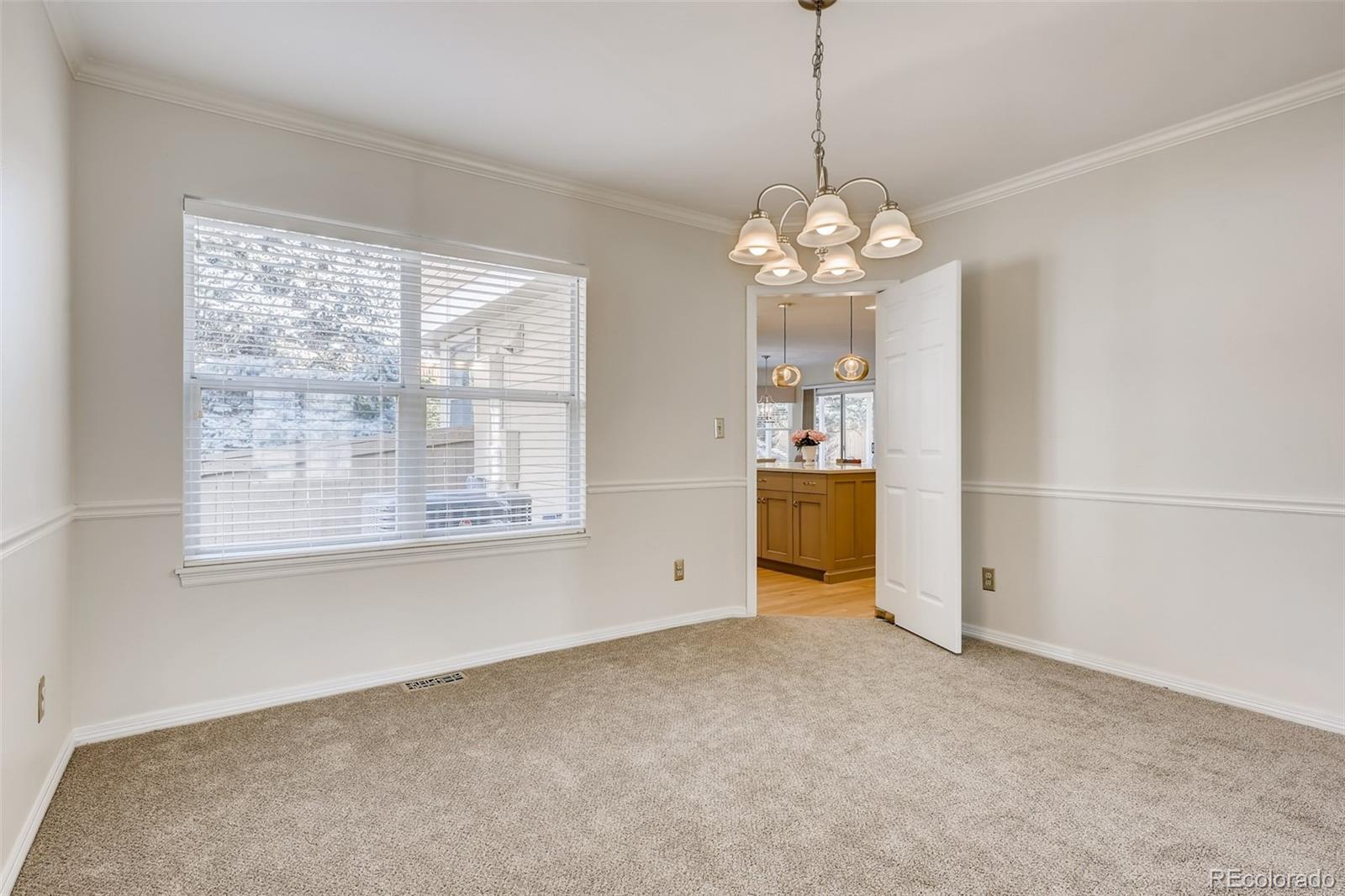9396 Desert Willow Road Highlands Ranch, CO 80129 - Photo 5 of 40 a view of an empty room with a window