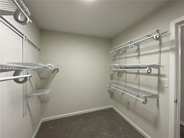 a view of a room with racks on the wall