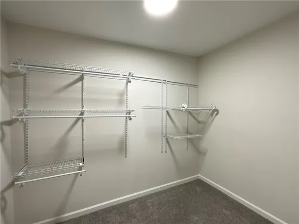a view of a room with racks on the wall