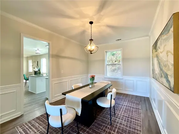 a living room with a couch and a table