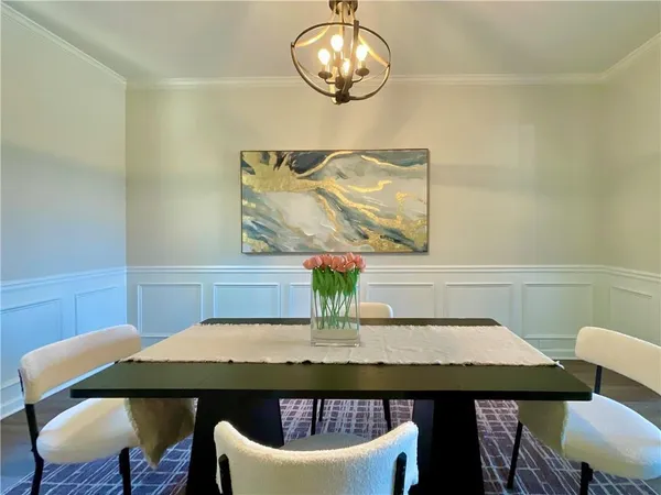 a view of a dining room with furniture