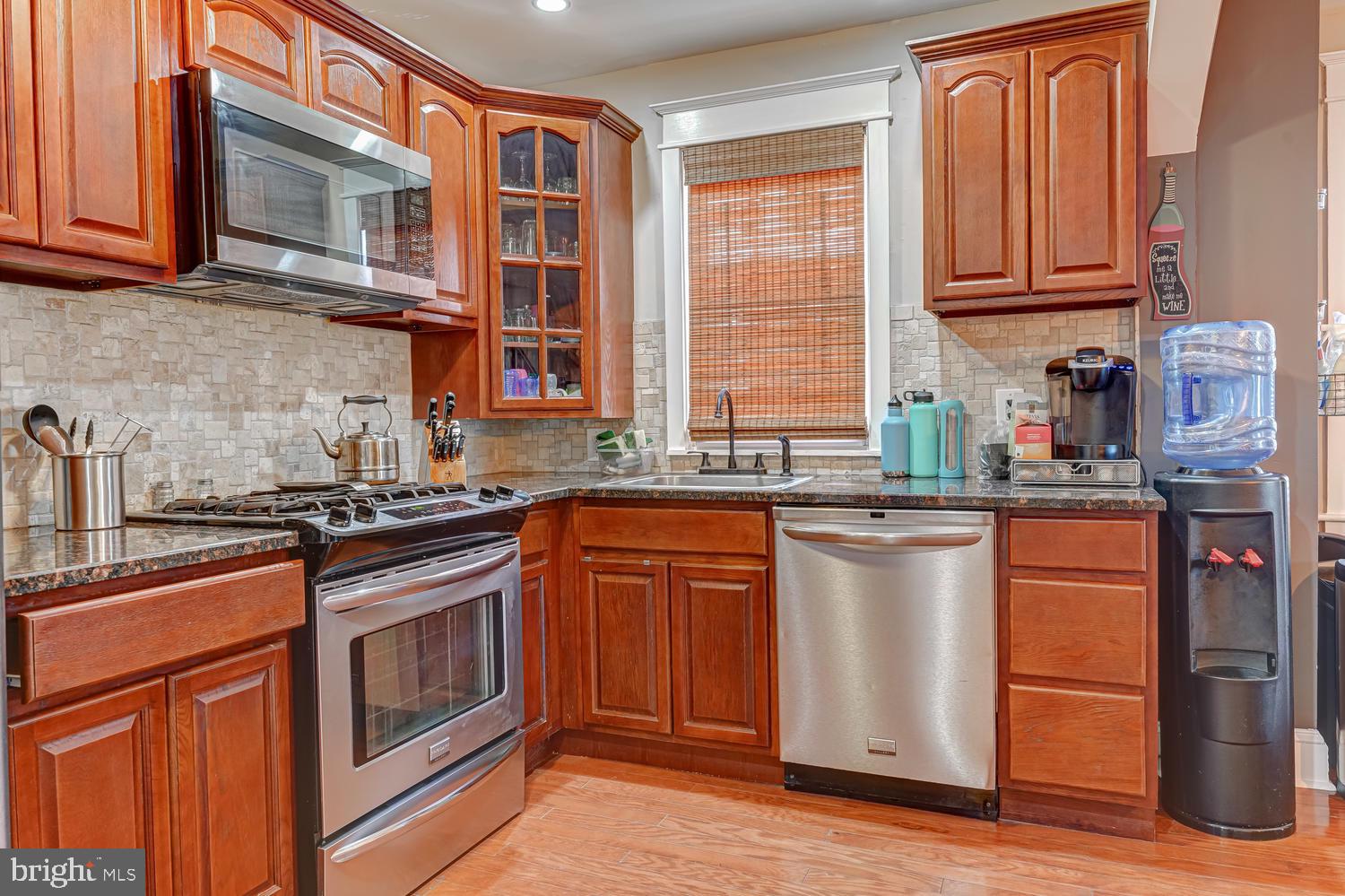 94 Marshall Road Lansdowne, PA 19050 - Photo 9 of 27 Kitchen with beautiful Cherry cabinets