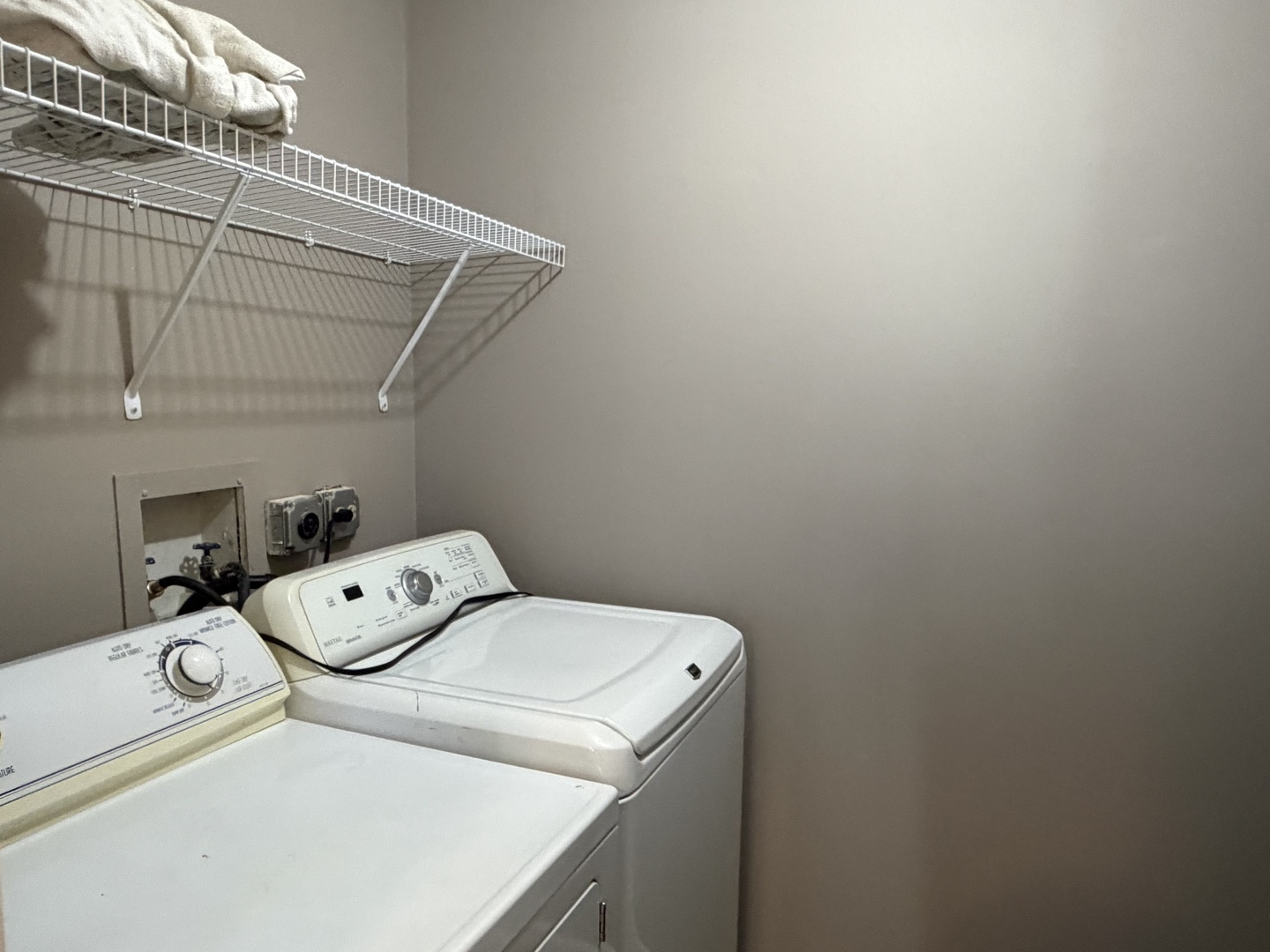 7594 Sarson Way Hanover Park, IL 60133 - Photo 19 of 26 a utility room with dryer and washer