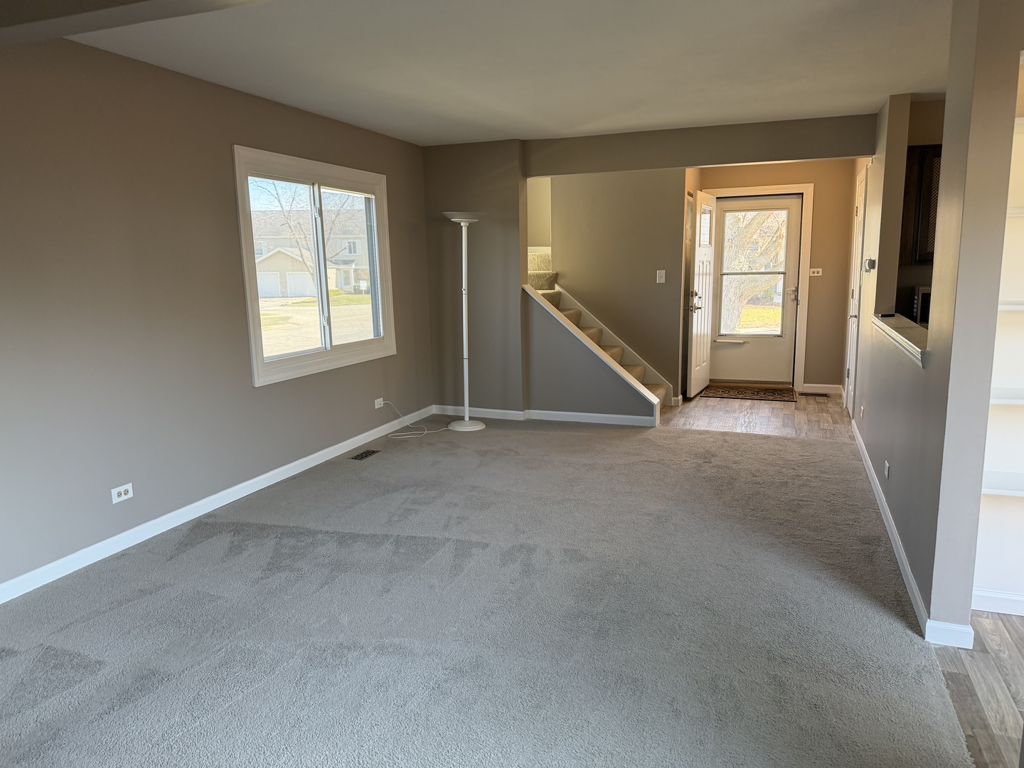 7594 Sarson Way Hanover Park, IL 60133 - Photo 5 of 26 an empty room with windows