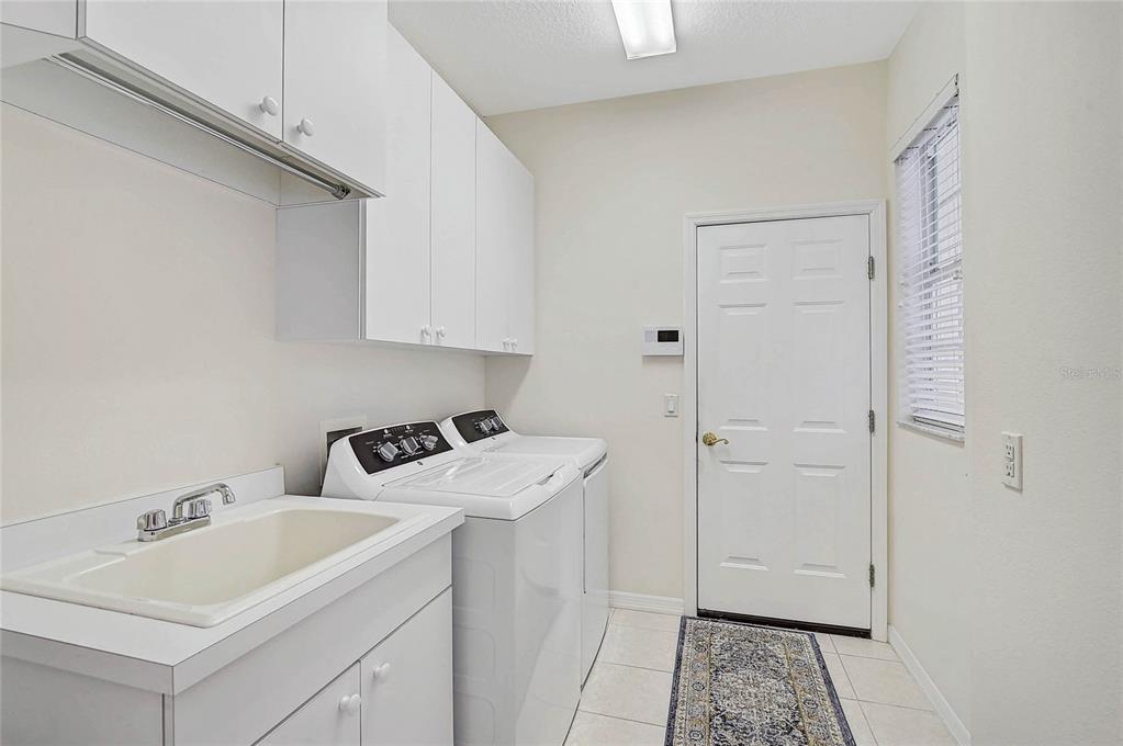 2111 Muskogee Trail Nokomis, FL 34275 - Photo 21 of 58 a bathroom with a sink and toilet