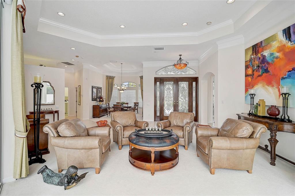 2111 Muskogee Trail Nokomis, FL 34275 - Photo 6 of 58 a living room with furniture and a large window