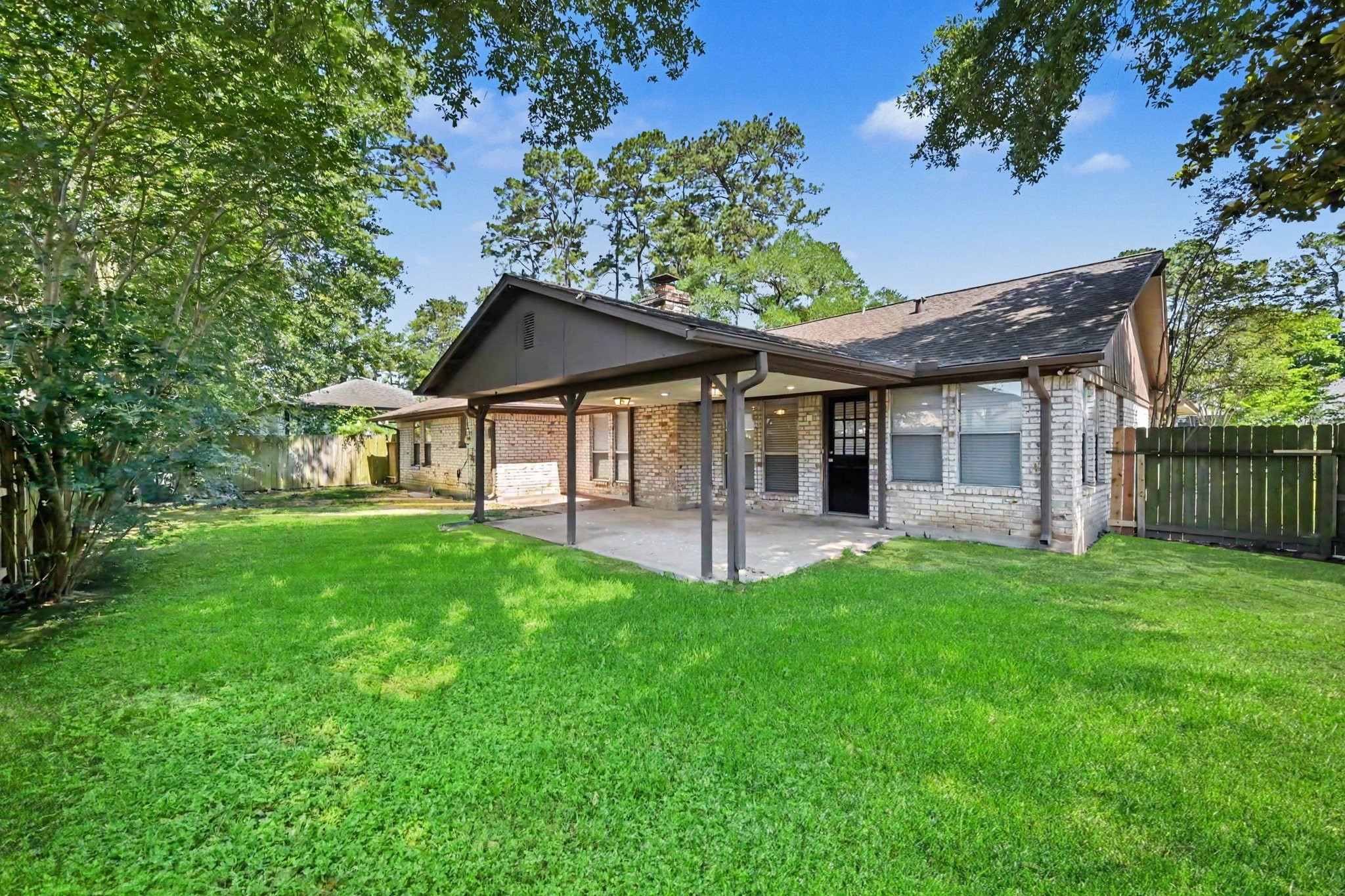 17419 Cassina Drive Spring, TX 77388 - Photo 33 of 35 a view of a house with a yard and porch