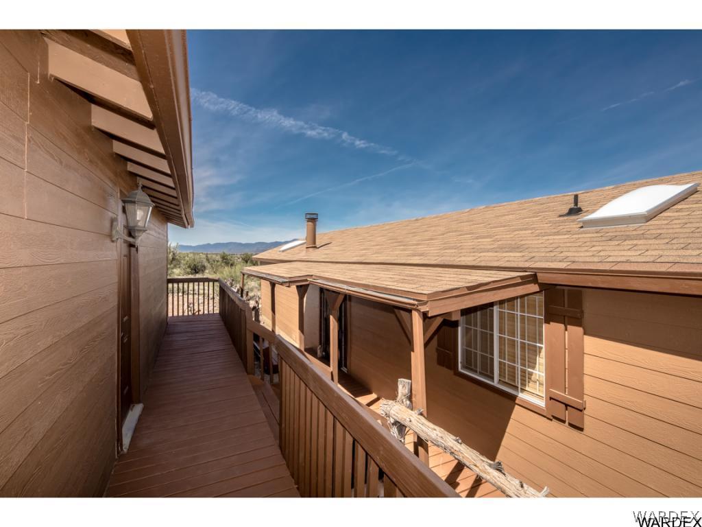 14760 Powerline Road Kingman, AZ 86401 - Photo 13 of 36 a view of an house with backyard