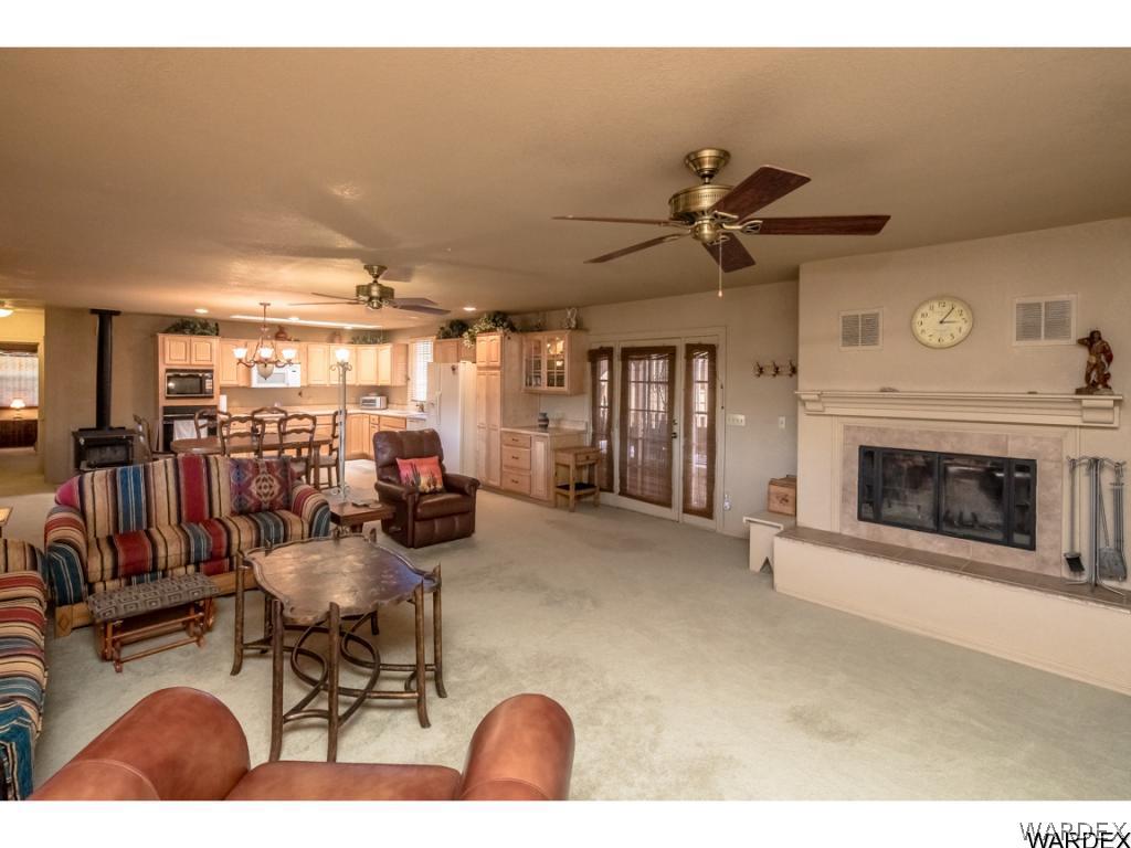 14760 Powerline Road Kingman, AZ 86401 - Photo 19 of 36 a view of a livingroom with furniture and a fireplace