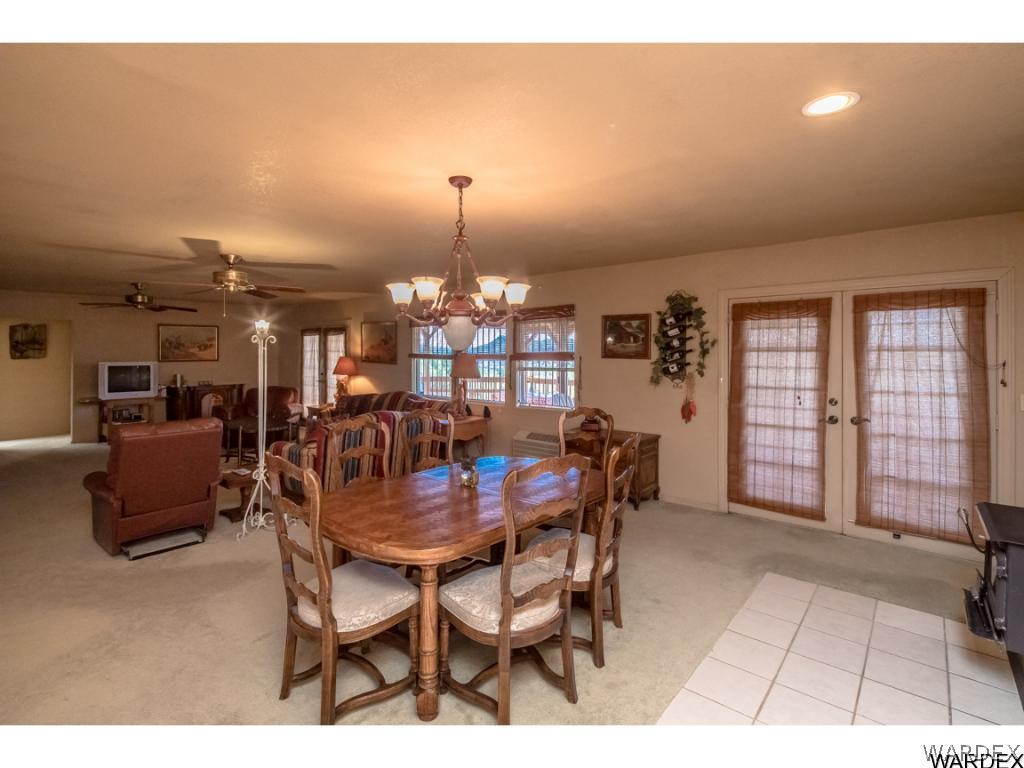 14760 Powerline Road Kingman, AZ 86401 - Photo 23 of 36 a view of a dining room with furniture