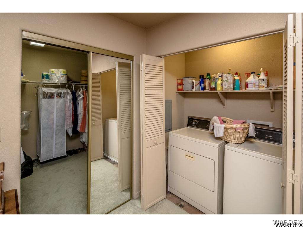 14760 Powerline Road Kingman, AZ 86401 - Photo 8 of 36 a utility room with closet dryer and washer