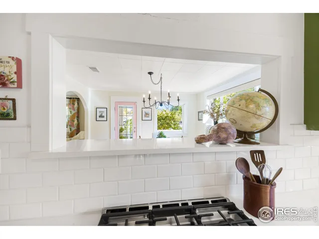 a bathroom with a sink a mirror and window