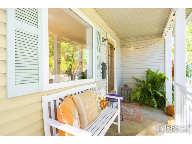 a view of balcony with furniture