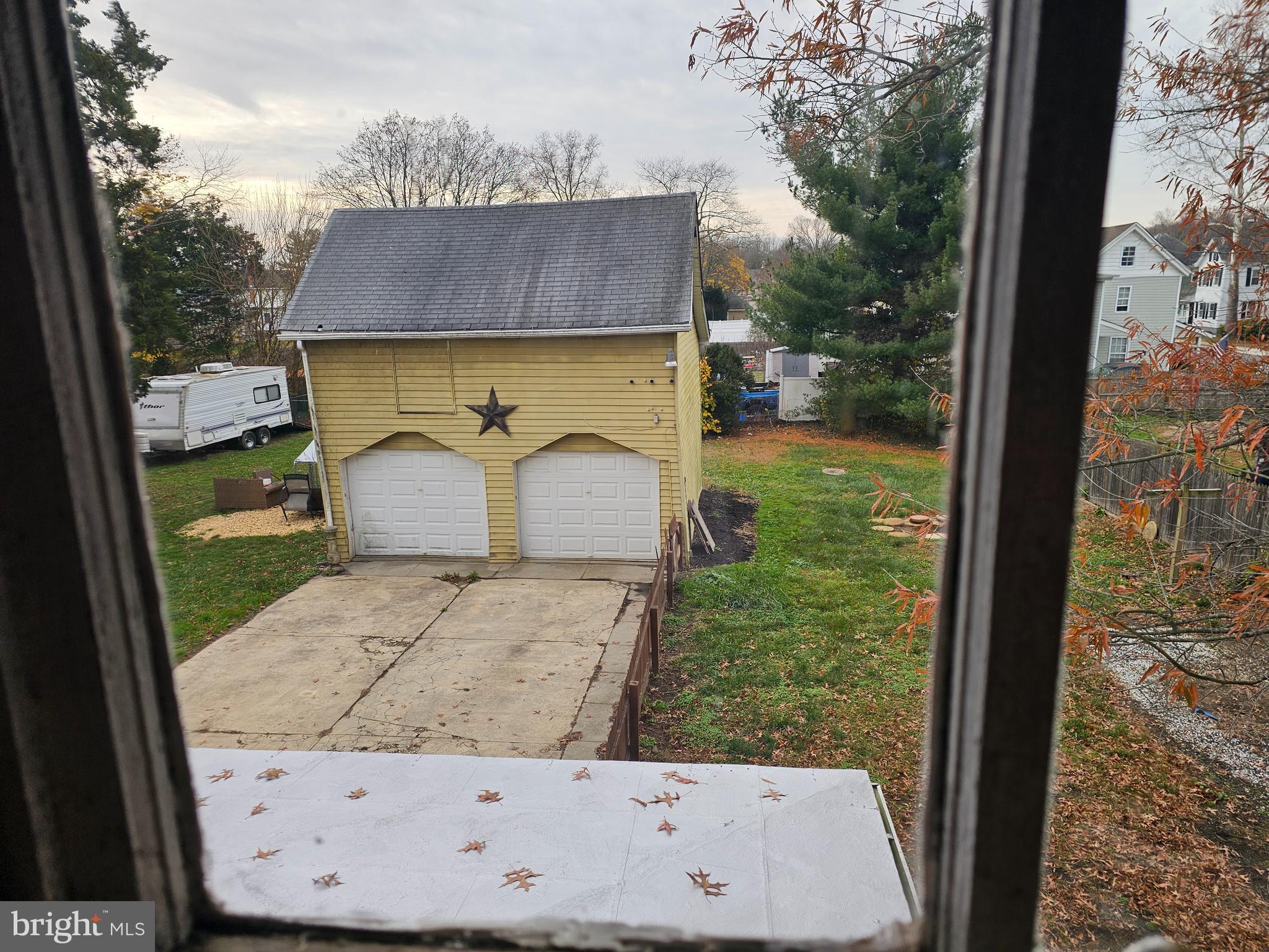 152 North Main Street Elmer, NJ 08318 - Photo 15 of 15 a view of a wooden door and a floor to ceiling window