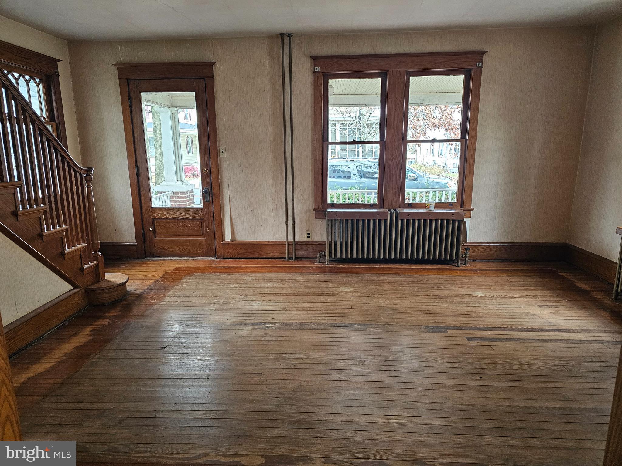 152 North Main Street Elmer, NJ 08318 - Photo 6 of 15 an empty room with windows