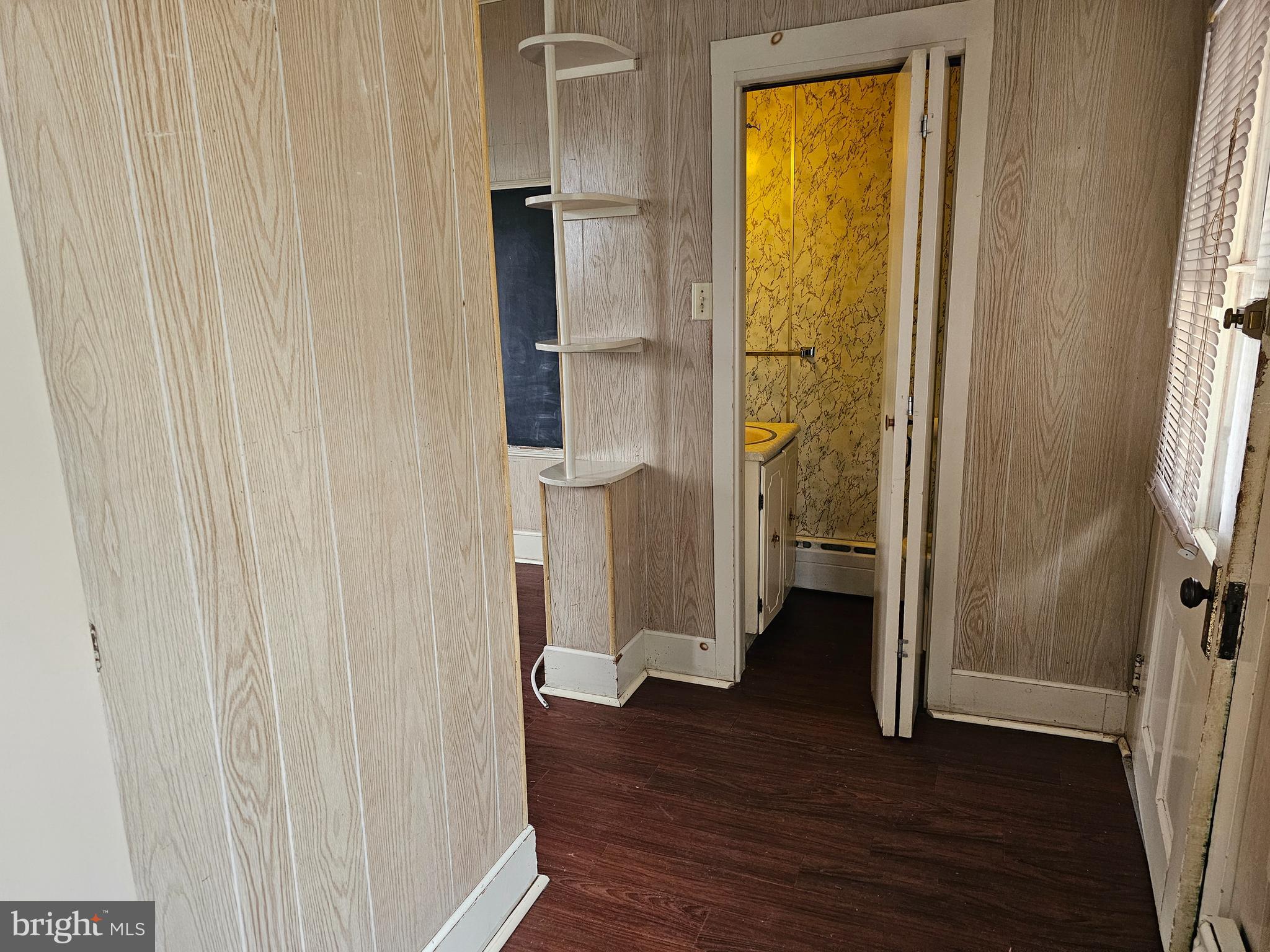 152 North Main Street Elmer, NJ 08318 - Photo 7 of 15 a view of walk in closet with window