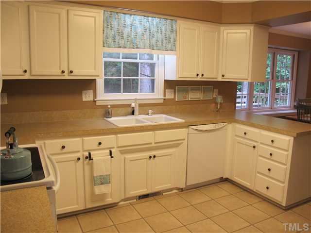 7536 Milestone Court Raleigh, NC 27615 - Photo 7 of 23 Large kitchen with lots of cabinets and 2 pantries.