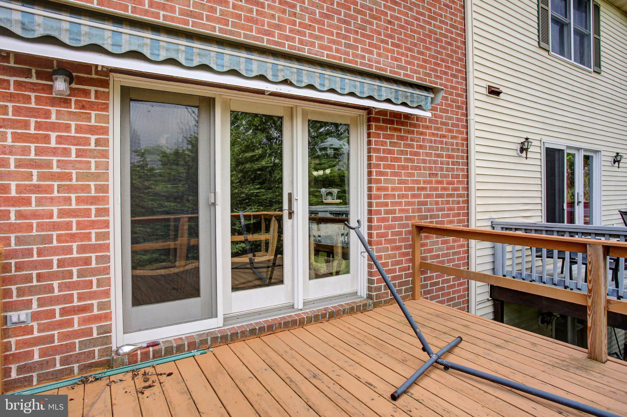 1557 Brechbill Road Chambersburg, PA 17202 - Photo 23 of 33 Charming deck with awning (2nd floor).