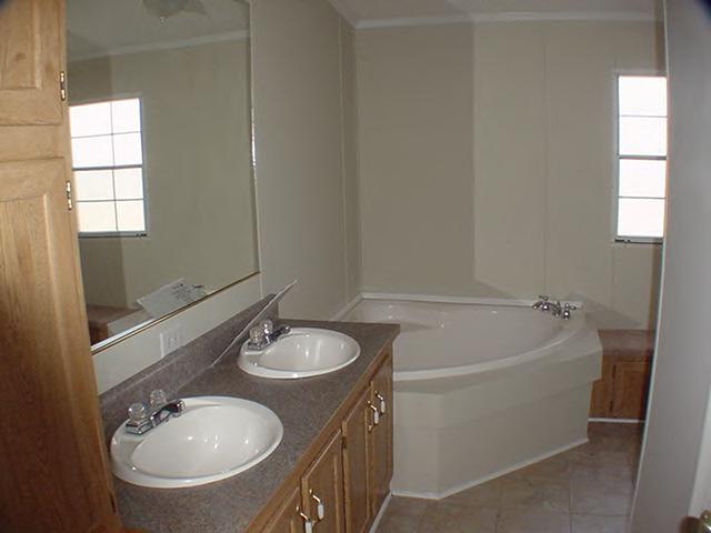 979 Hobson Road Axton, VA 24054 - Photo 8 of 10 a bathroom with a sink and a mirror