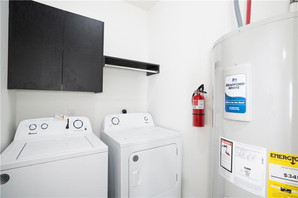 12509 North 40th Street, Unit 4 Edinburg, TX 78541 - Photo 13 of 27 a utility room with dryer and washer
