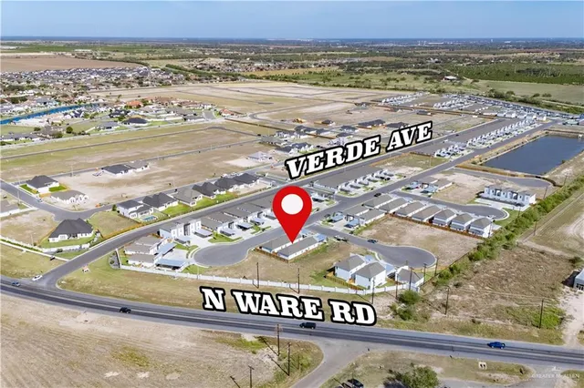 a view of a street with an ocean view